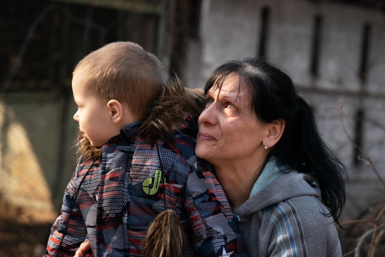 Scenes from Ukraine: A grandmother cries at the sight of destroyed apartment building